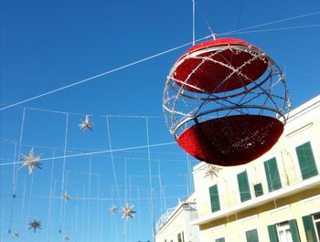 Low angle view of building against blue sky