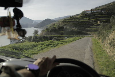 Road passing through car windshield