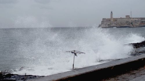 Waves splashing on rocks