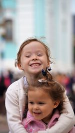 Portrait of smiling siblings