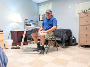 Portrait of man sitting on chair