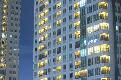 Low angle view of illuminated building at night