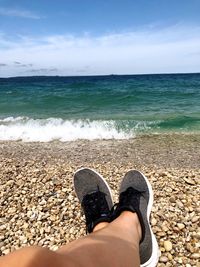 Low section of person on beach