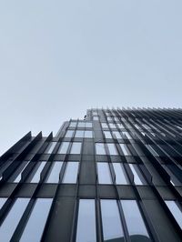 Low angle view of modern building against clear sky