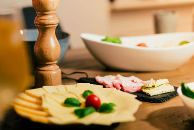 Close-up of served food on table