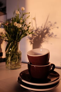 Close-up of coffee cup on table