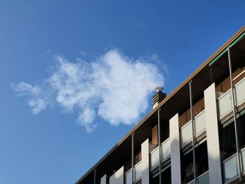 Low angle view of building against blue sky