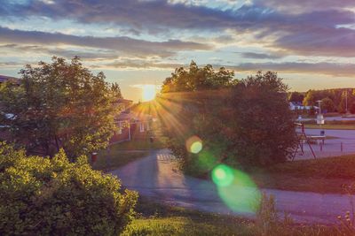 Sun shining through clouds