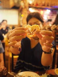 Close-up of woman eating food