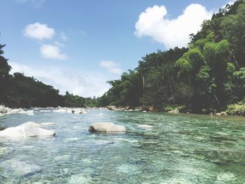 Scenic view of sea against cloudy sky