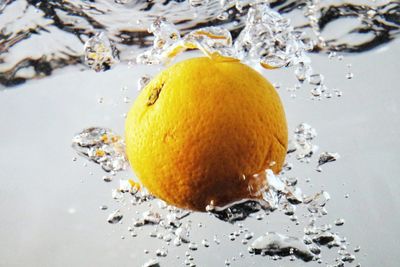 Close-up of lemon in water