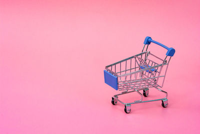 Metallic structure against pink background