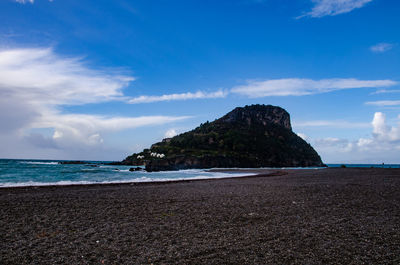 Scenic view of beach against sky