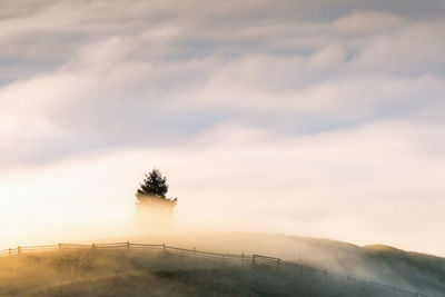 Scenic view of landscape against sky during sunset