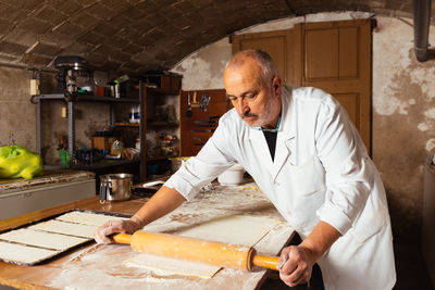 Chef preparing food at home