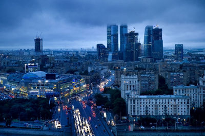 Illuminated cityscape at night