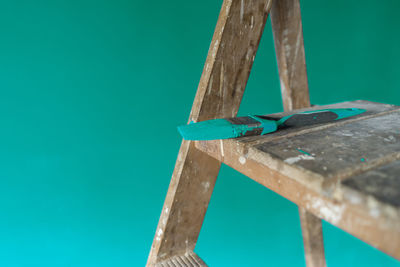 Close-up of metallic structure on table