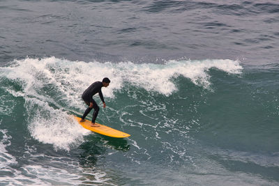 Man surfing in sea