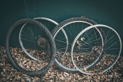 High angle view of abandoned bicycle wheel