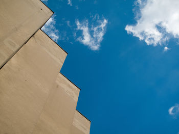 Low angle view of built structure against blue sky