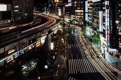 High angle view of light trails on road at night