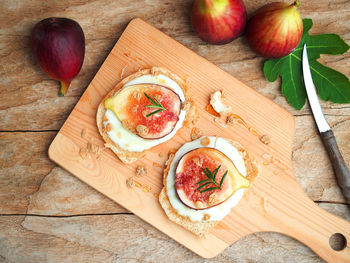 High angle view of fruits on cutting board