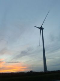 Traditional windmill on field