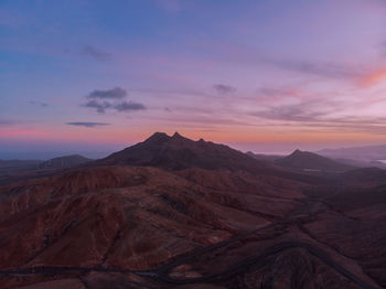 Scenic view of mountains during sunset