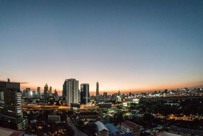 High angle view of buildings against sky during sunset