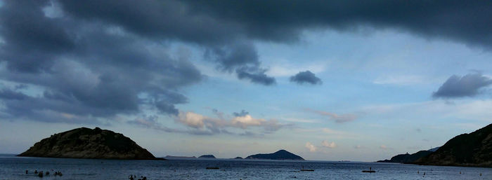 Scenic view of sea against cloudy sky