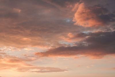 Low angle view of clouds in sky during sunset