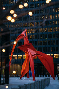 Low angle view of illuminated building at night