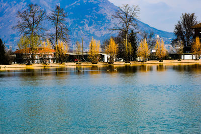 Scenic view of lake against blue sky