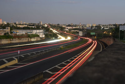 High angle view of light trails on road at night