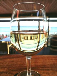 Close-up of beer glass on table