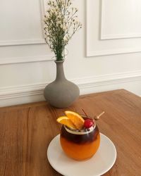 Potted plant on table at home