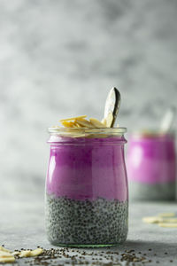 Close-up of drink in glass jar on table