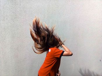 Woman tossing hair