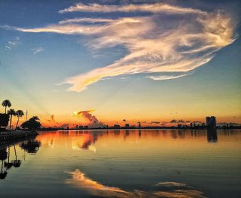 View of calm lake at sunset