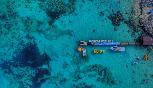 Aerial view of boats floating on sea