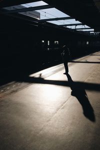 Silhouette of people in city at night