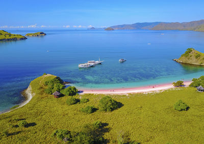 Scenic view of sea and bay against sky at flores island