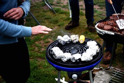 Low section of man on barbecue grill