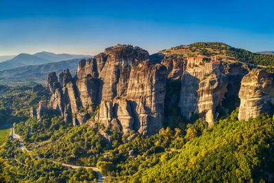 Panoramic view of rock formations against sky