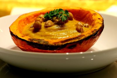 Close-up of pumpkin soups erved in plate