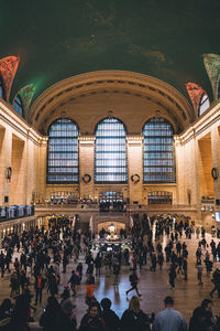 Group of people at railroad station