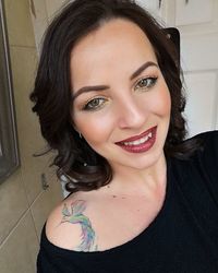 Portrait of smiling woman at home