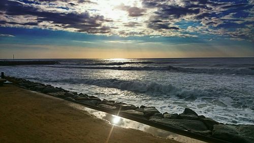 Scenic view of sea at sunset