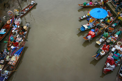 High angle view of people on boat in river