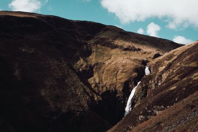 Low angle view of mountain against sky